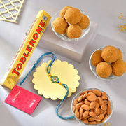Floral Shaped Bhai Rakhi Gourmet Hamper