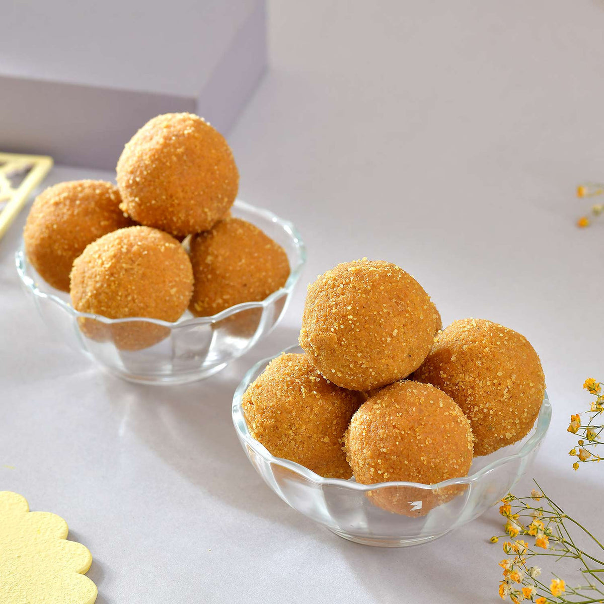 Floral Shaped Bhai Rakhi Gourmet Hamper