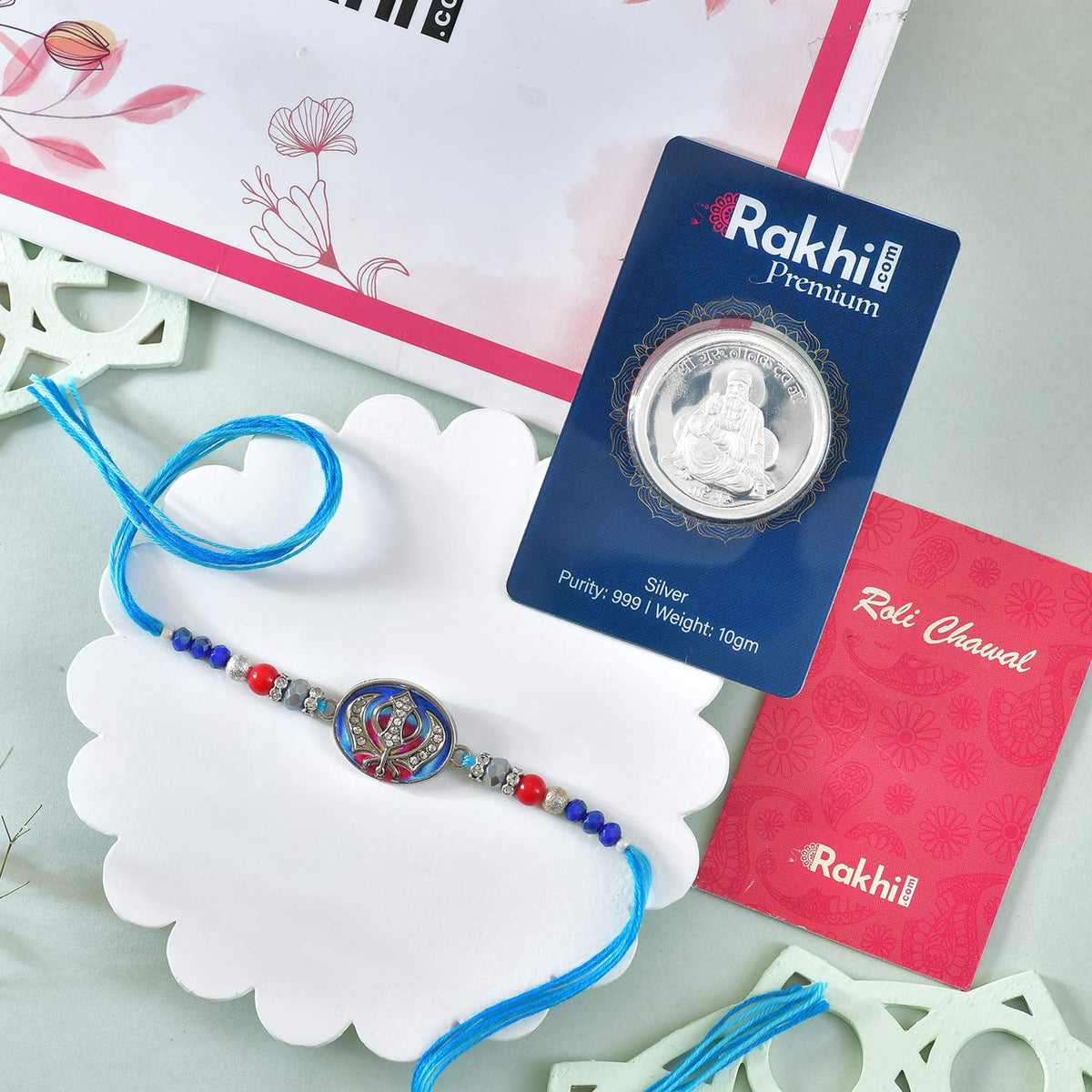 Divine Rakhi With Guru Nanak Silver Coin 10gm