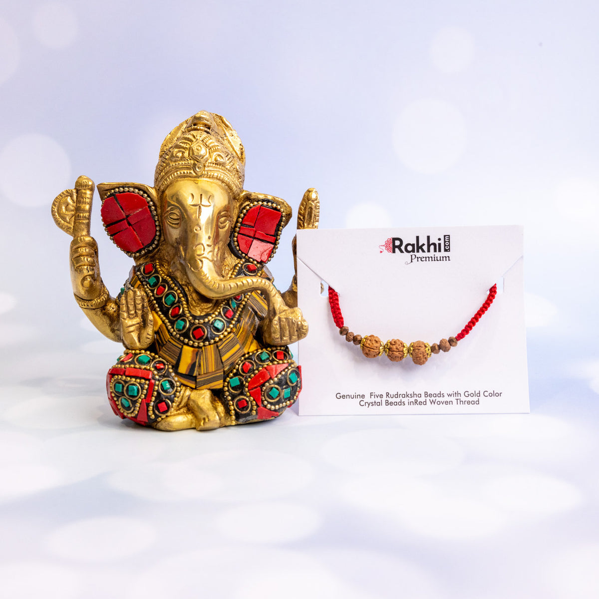 Rudraksha Rakhi With Brass Ganesha Idol