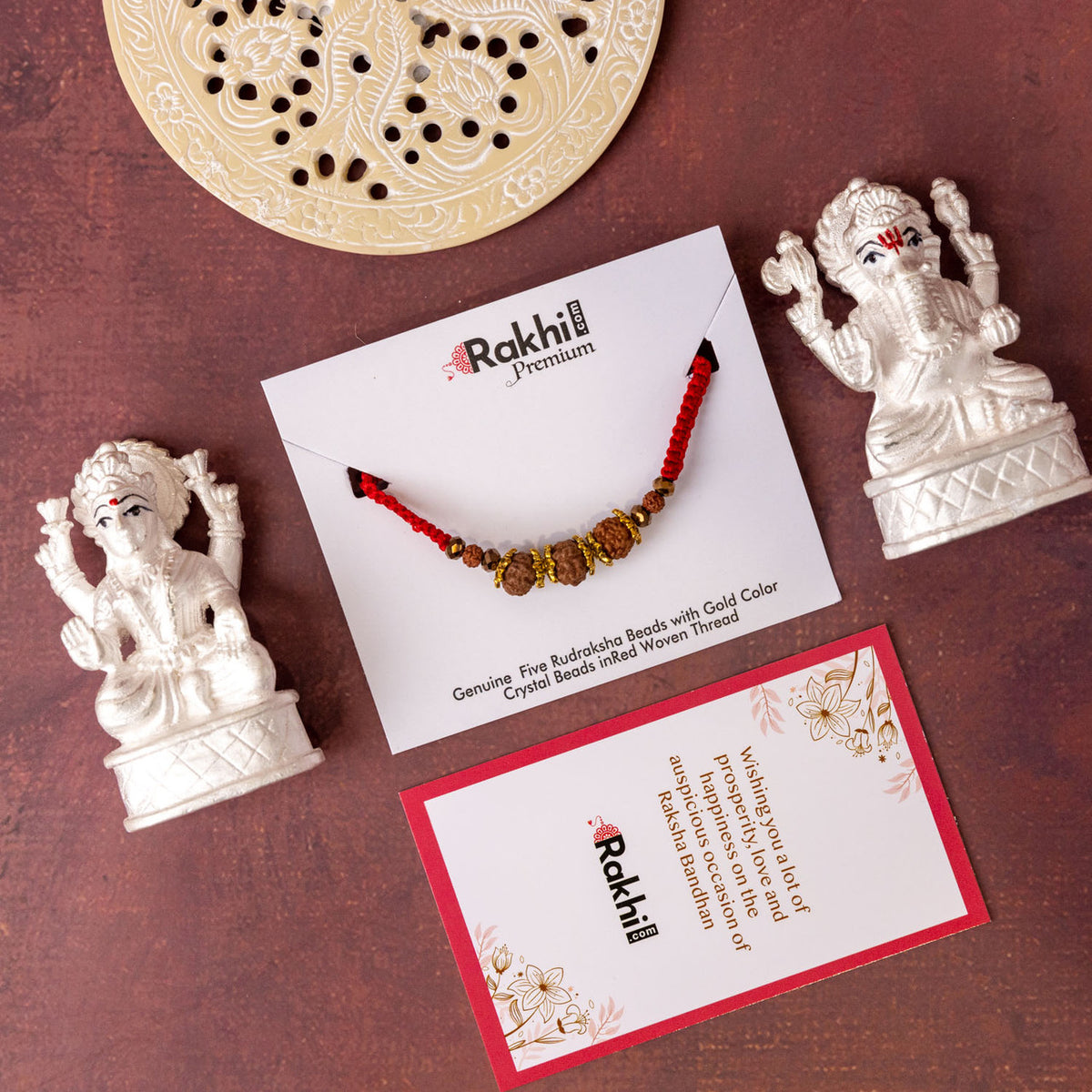Premium Rudraksh Rakhi with Silver Laxmi Ganesha Statue (999)