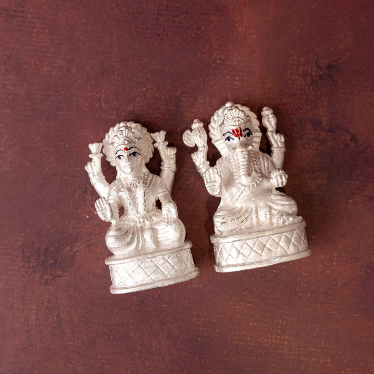 Premium Rudraksh Rakhi with Silver Laxmi Ganesha Statue (999)