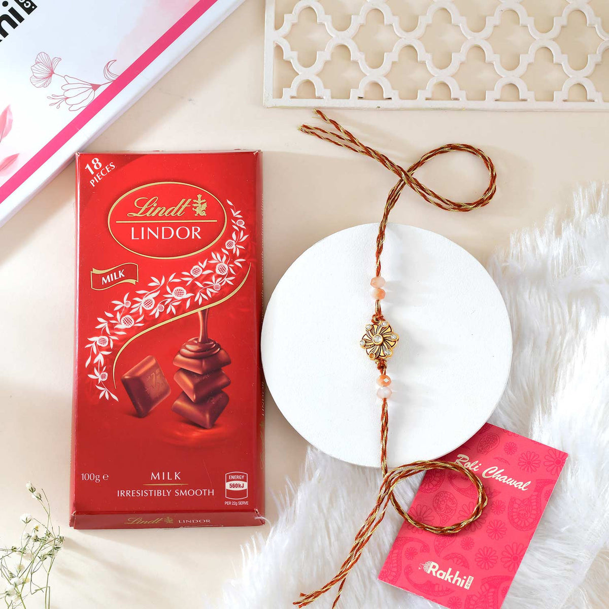 Floral Shaped Rakhi With Lindt Lindor Chocolate Combo