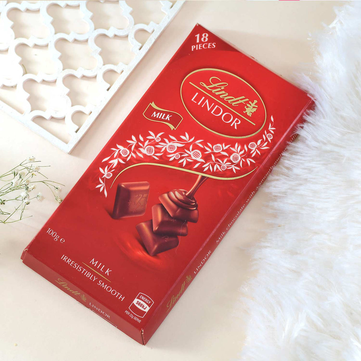 Floral Shaped Rakhi With Lindt Lindor Chocolate Combo