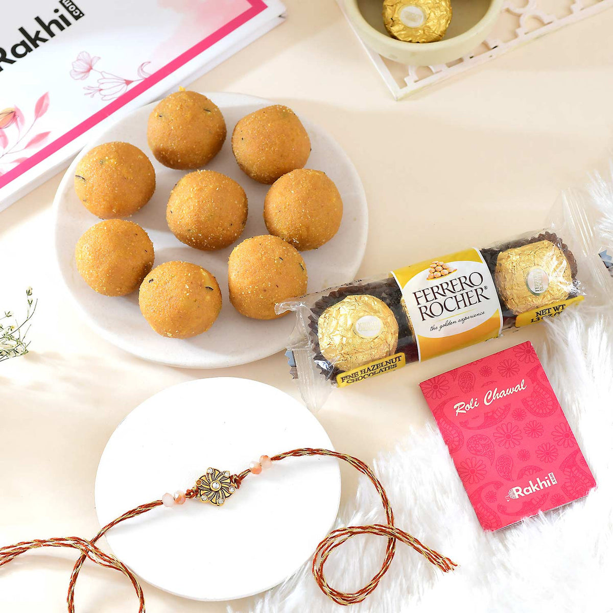 Floral Shaped Rakhi with Besan Laddoo & Ferrero
