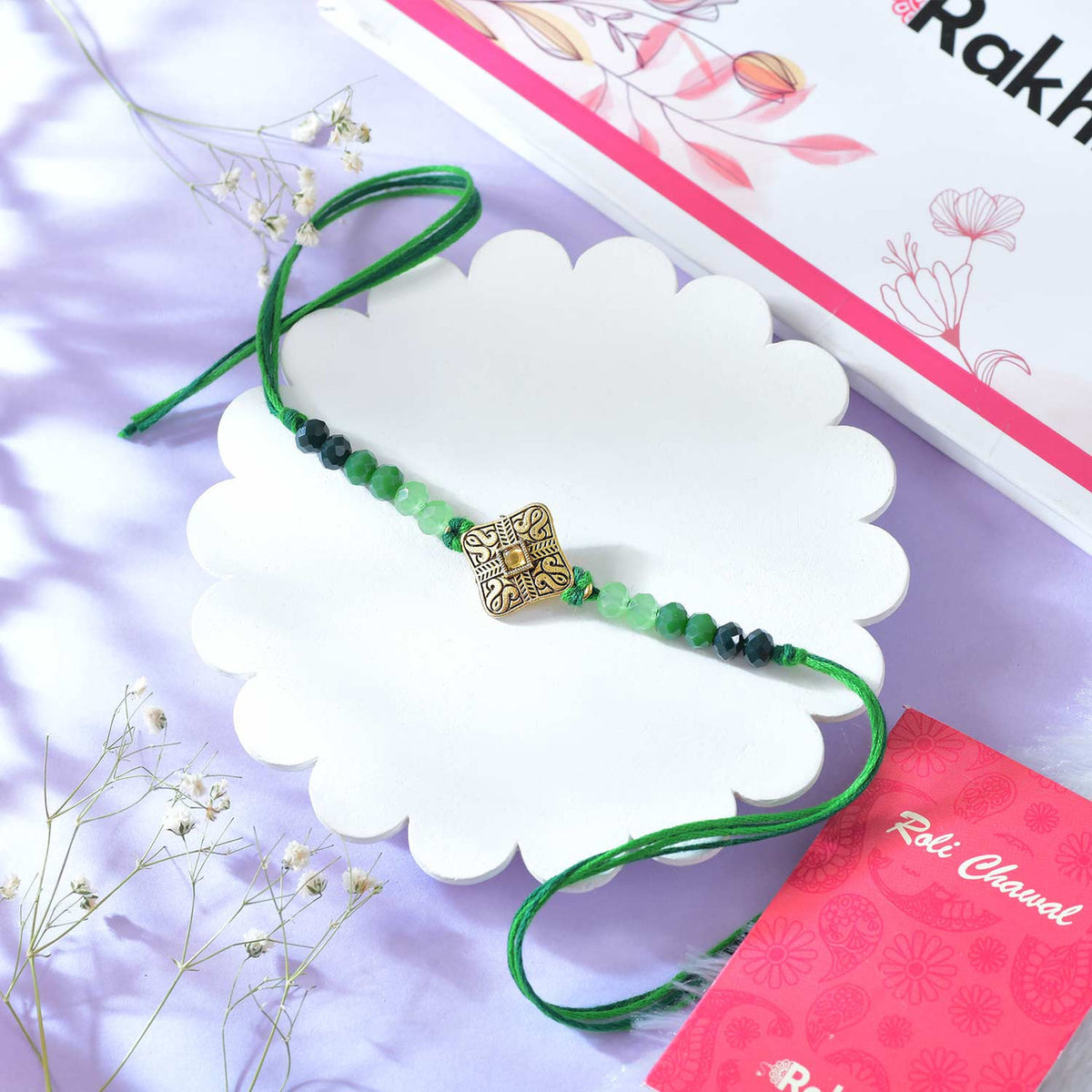 Elegant Beaded Rakhi with Green Thread With Cashew