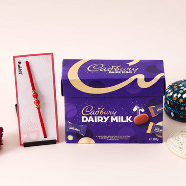 Red Pearl Rakhi with Cadbury Dairy Milk Assorted Gift Box