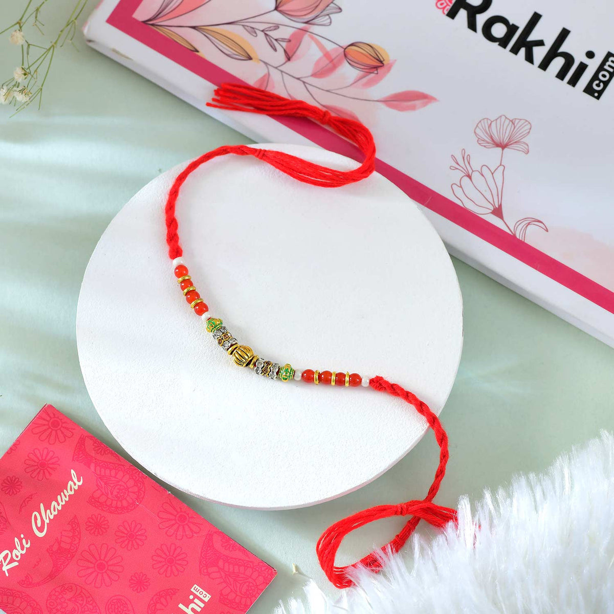 Gorgeous Red Moti Rakhi With Chocolates And Nuts