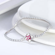 Enchanting 925 Sterling Silver Tennis Bracelet with Red CZ Clover Clasp