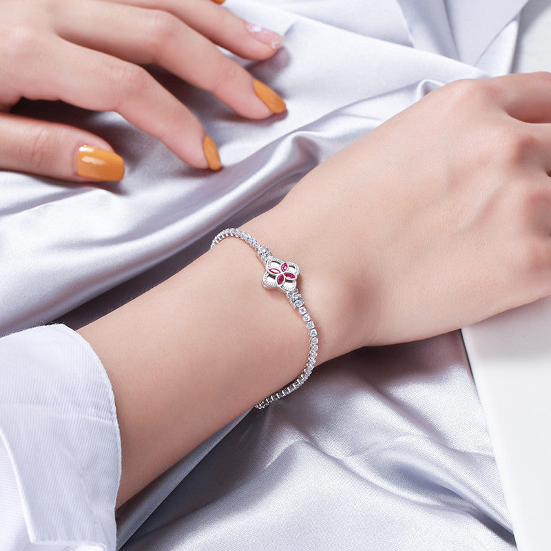 Enchanting 925 Sterling Silver Tennis Bracelet with Red CZ Clover Clasp