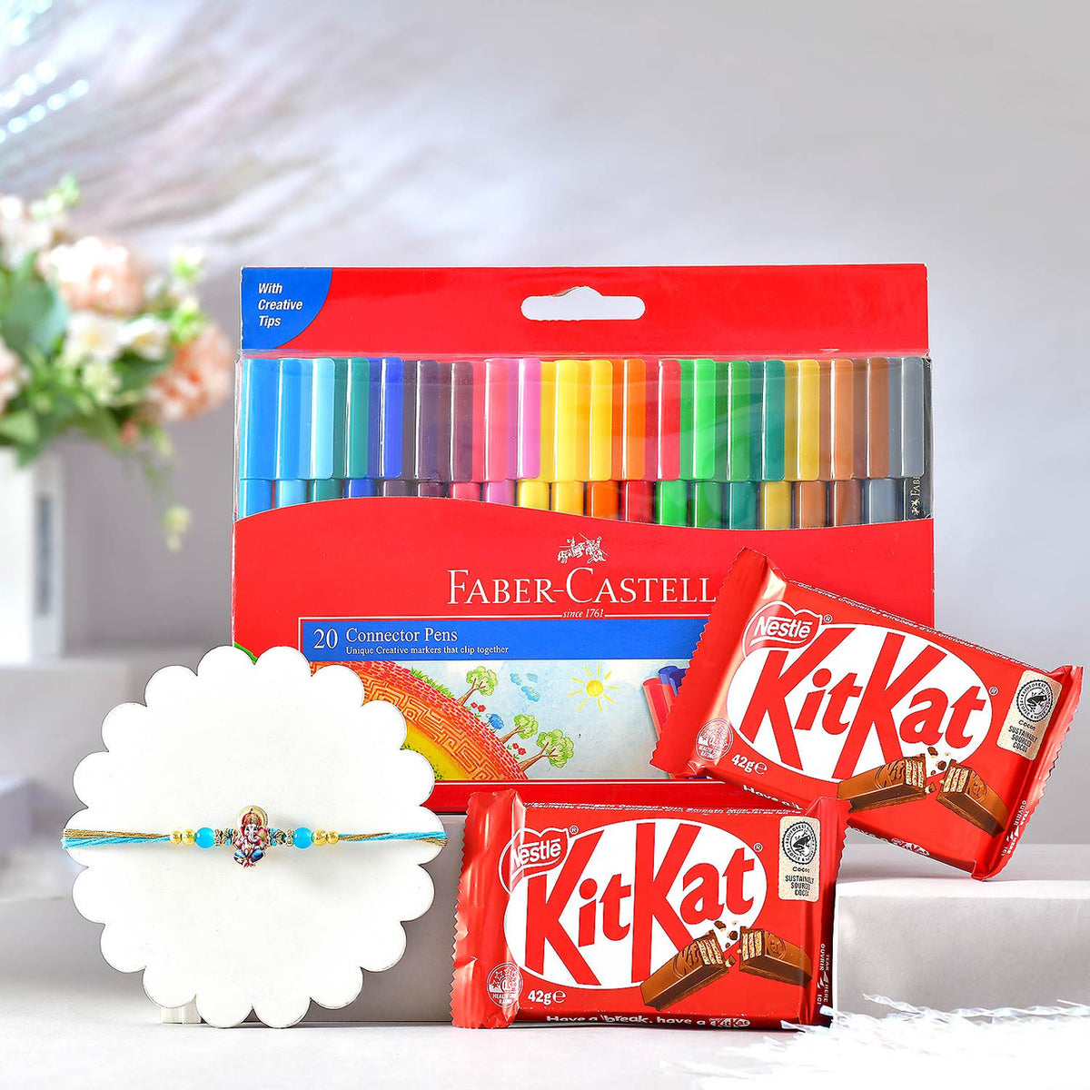 Ganesha Rakhi With Colors & Chocolates