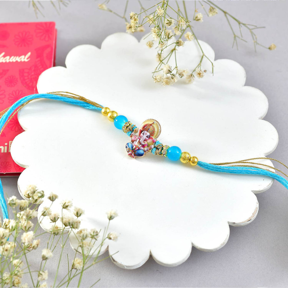 Ganesha Rakhi With Colors & Chocolates