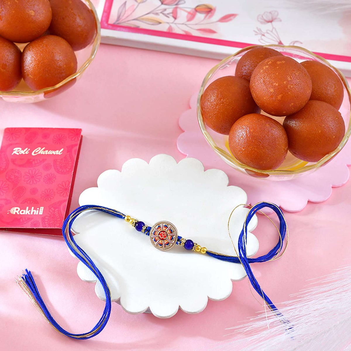 Divine Om Rakhi with Royal Blue Thread With Gulabjamun