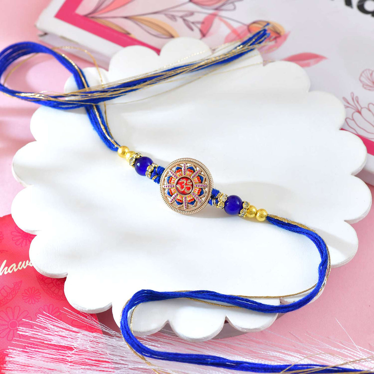 Divine Om Rakhi with Royal Blue Thread With Gulabjamun
