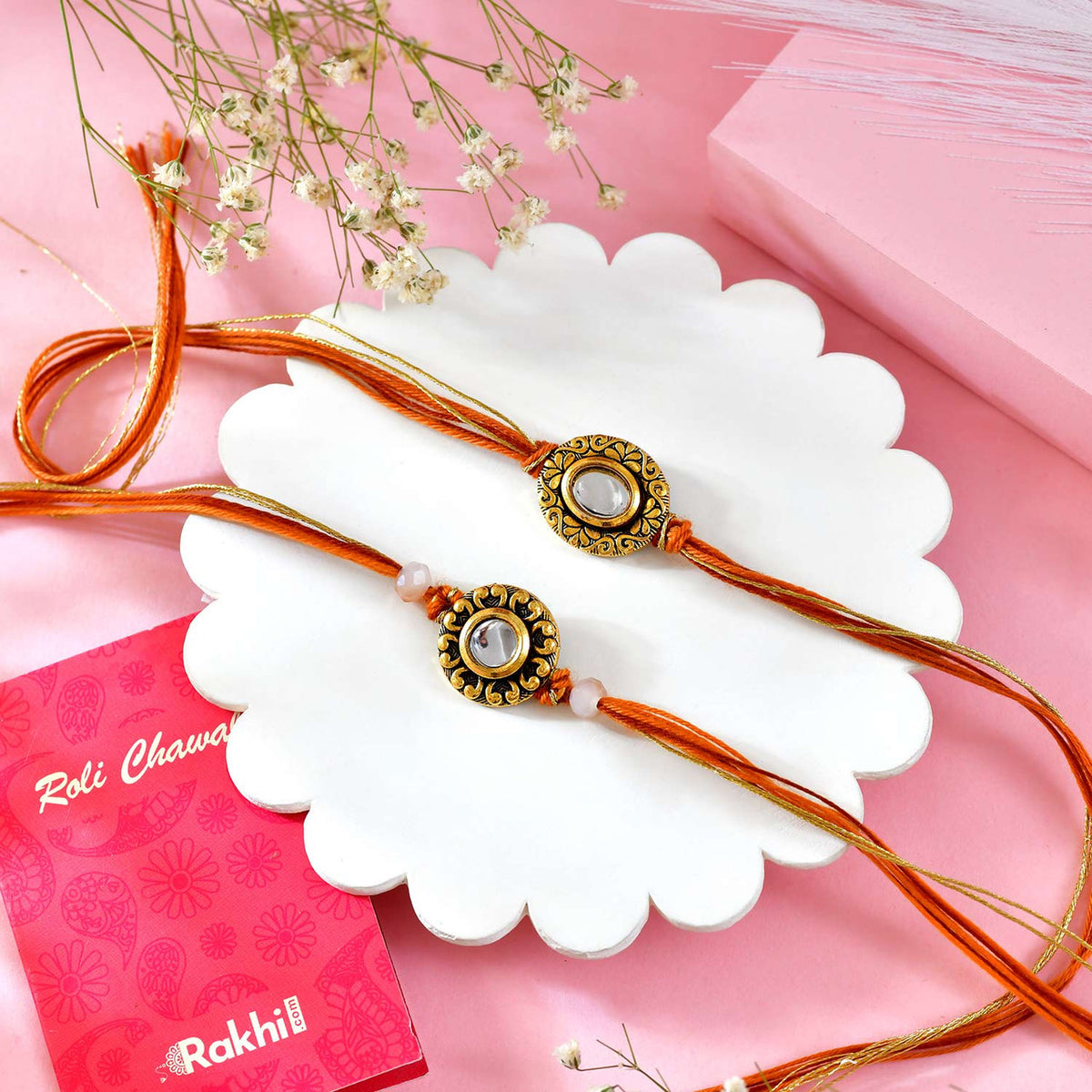 Set of 2 Vibrant Rakhi With Chocolate & Laddoo