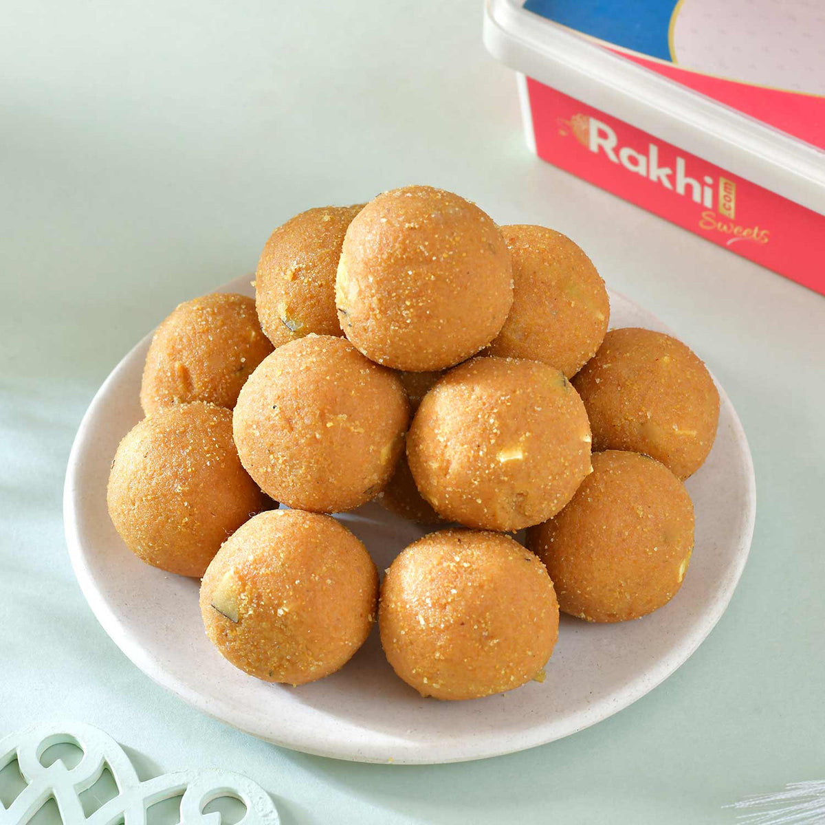 Designer Rakhi Set with Besan Laddoo & Ferrero Rocher