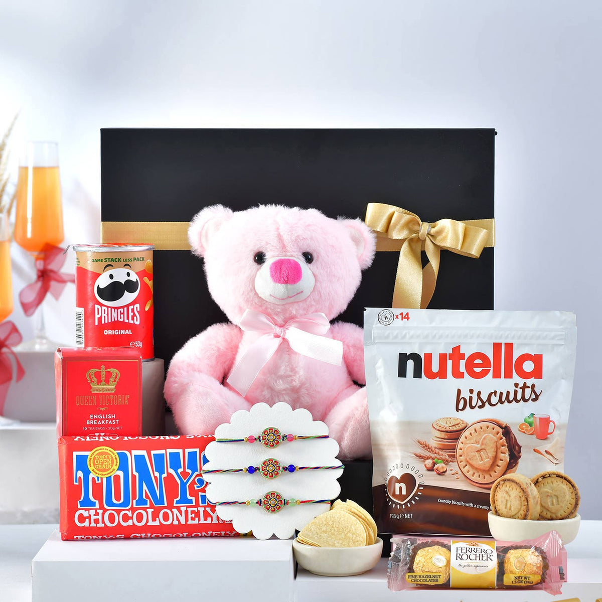 Cute Rakhi Gift Hamper with Teddy, Snacks & Designer Rakhis
