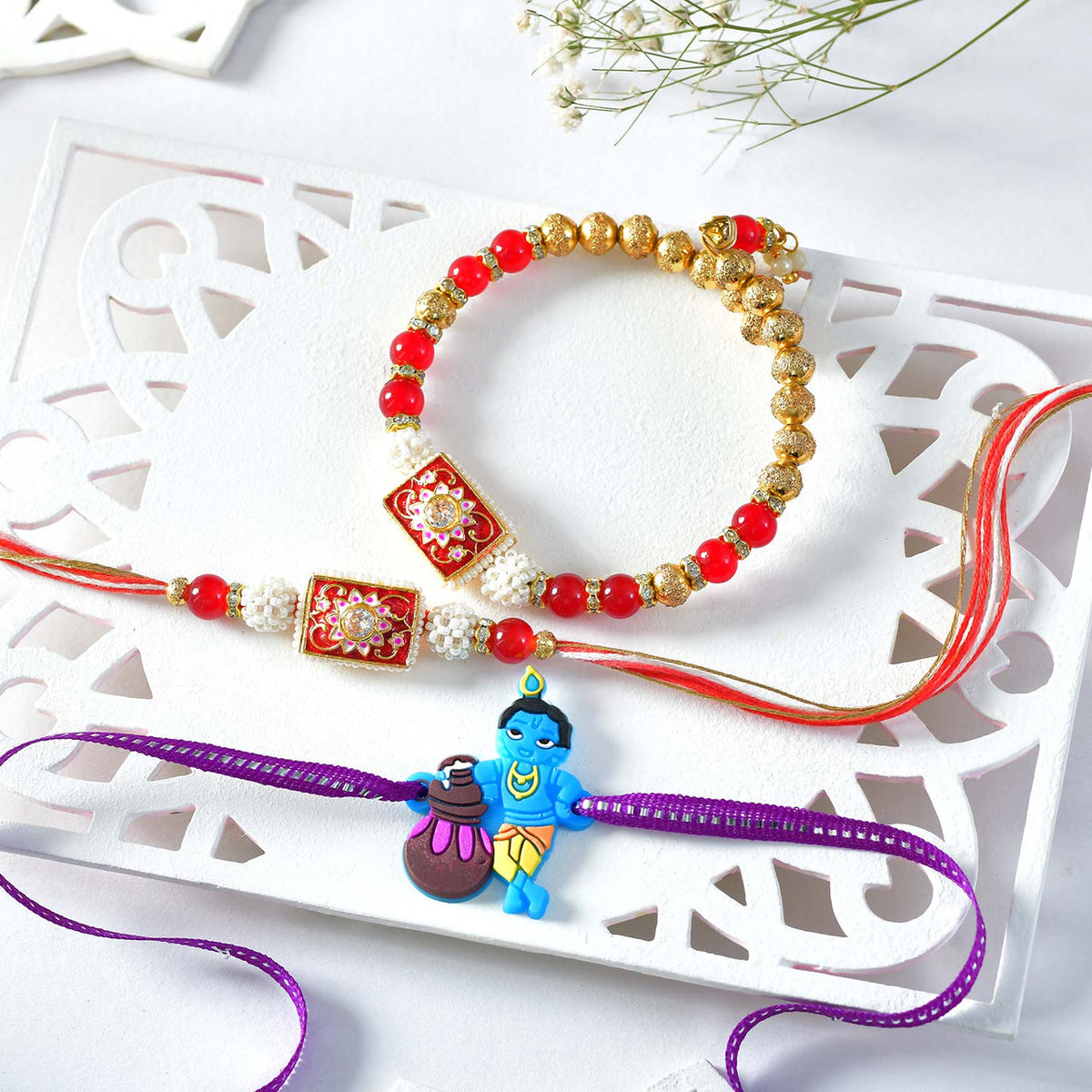 Divine Trio Rakhi Set with Chocolates & Soan Papdi