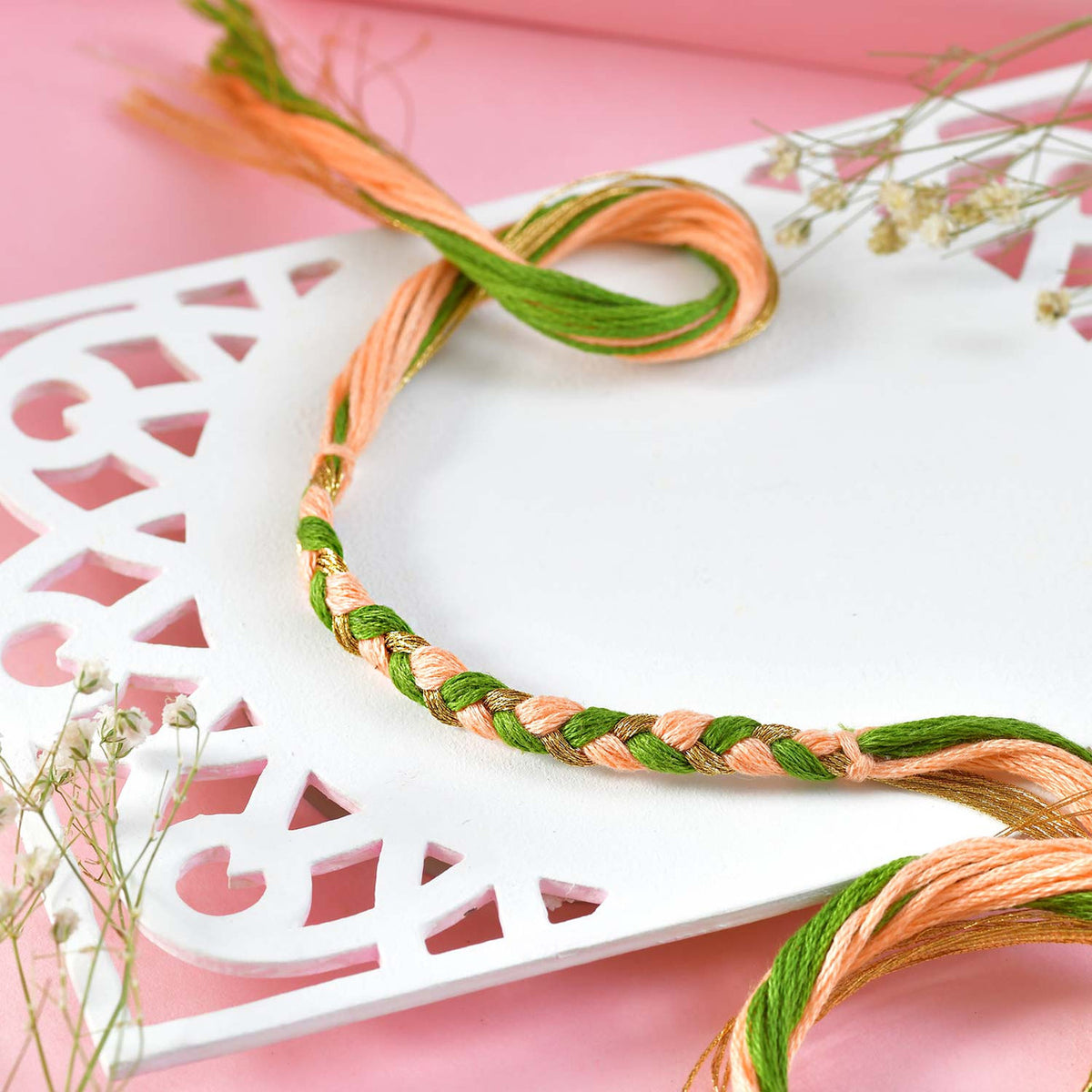 Elegant Rakhi Set with Ganesha Charm