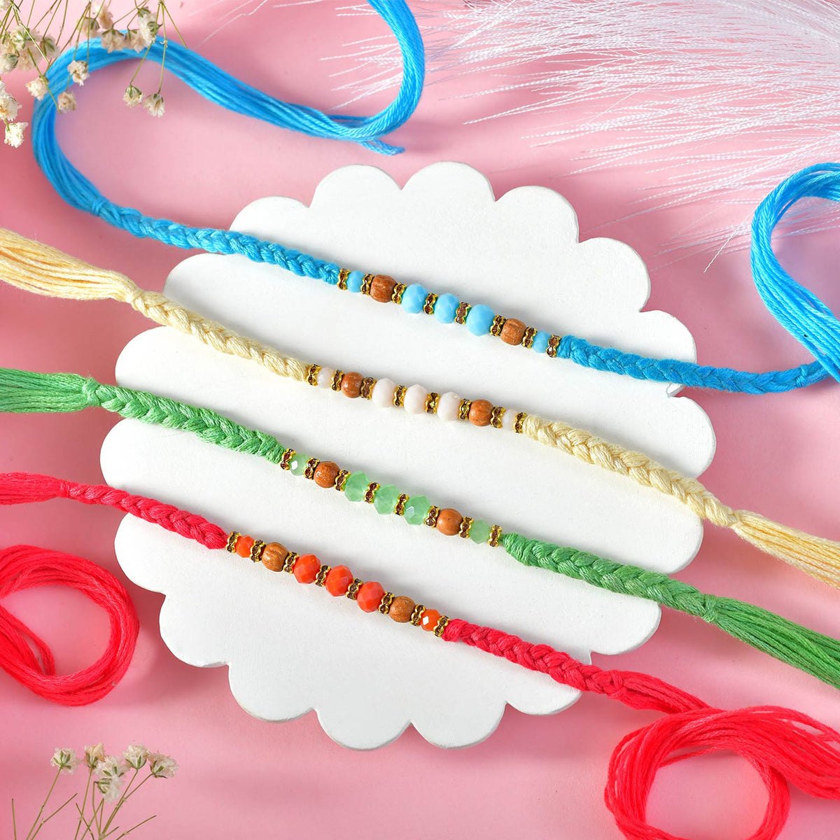 Set of Four Rakhi With Gourmet Hamper