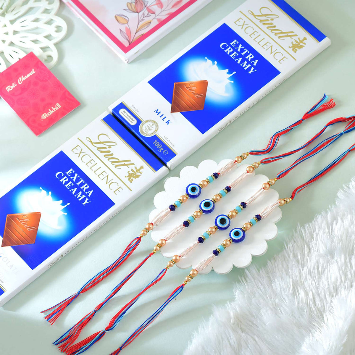 Set of 4 Evil Eye Rakhi With Lindt Chocolate