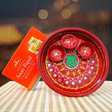 Red Painted Steel Thali with Soan Papdi