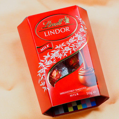 Brass Laxmi Diya with Lindt Lindor