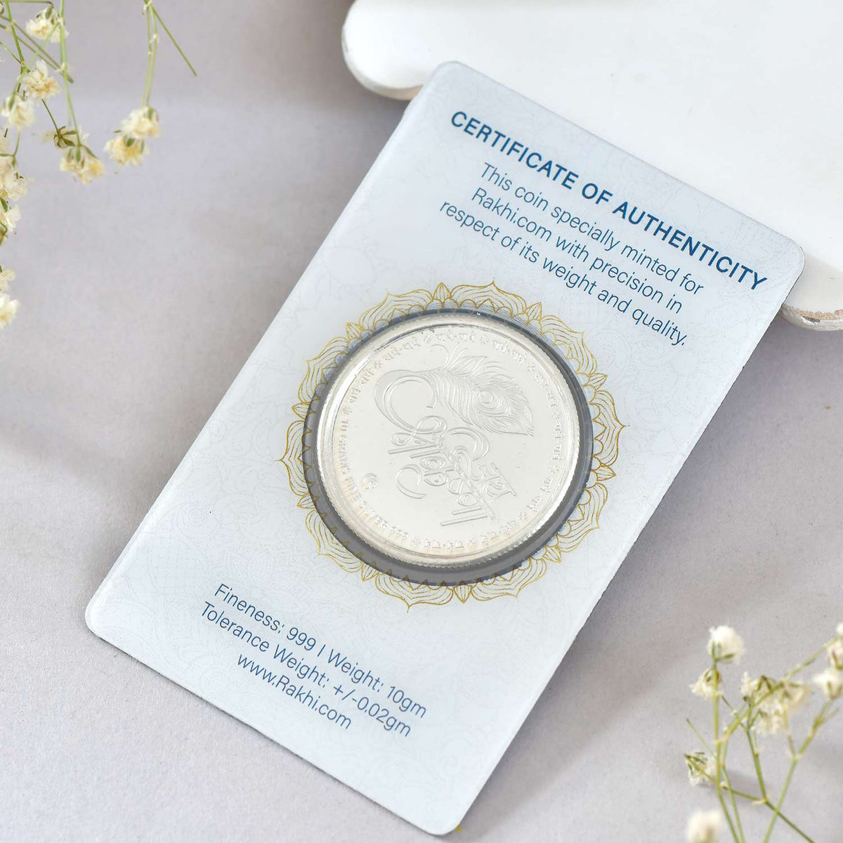 Floral Rakhi with Radha Krishna 10gm Silver Coin