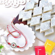 Elegant Om Circular Rakhi with Kaju Katli