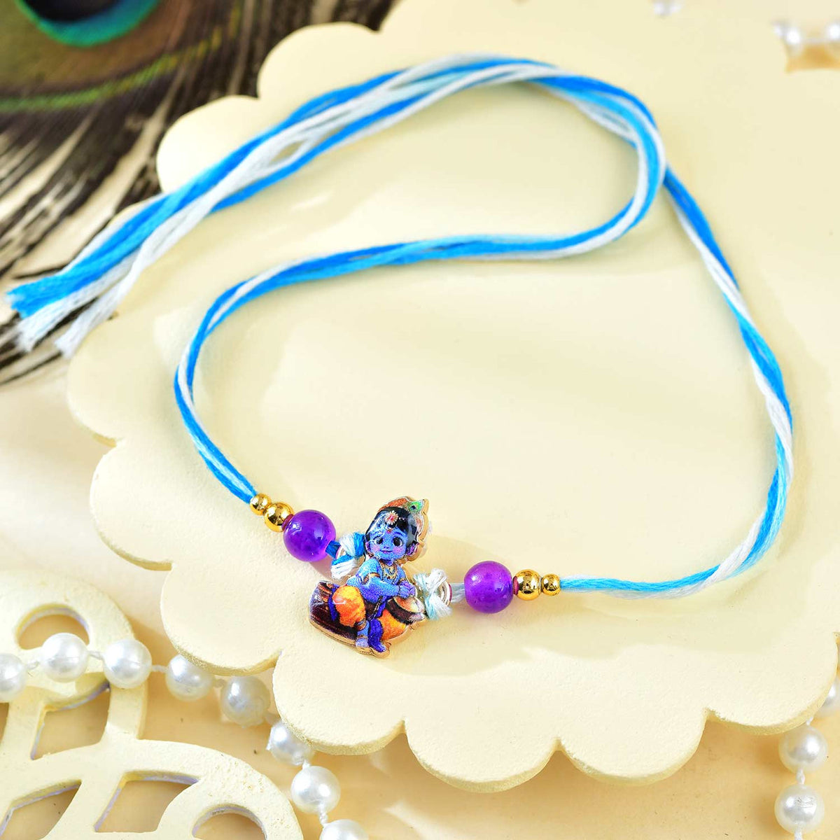 Little Krishna Kid's Rakhi With Snickers Chocolates
