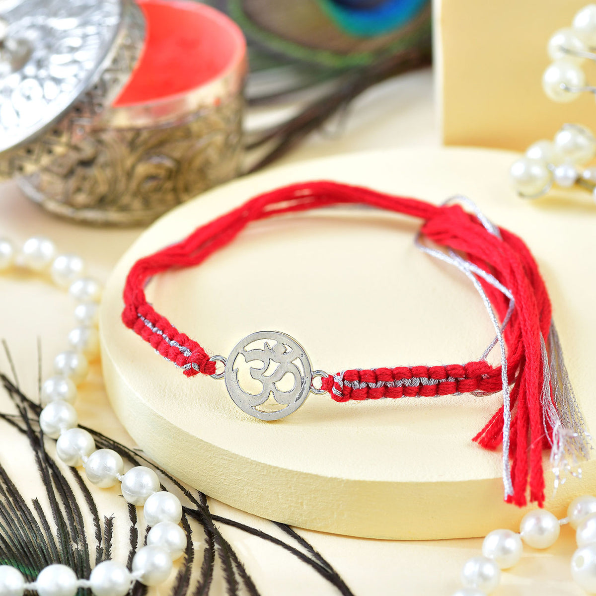 Pure Silver Om Rakhi with Ferrero Rocher & Soan Papdi