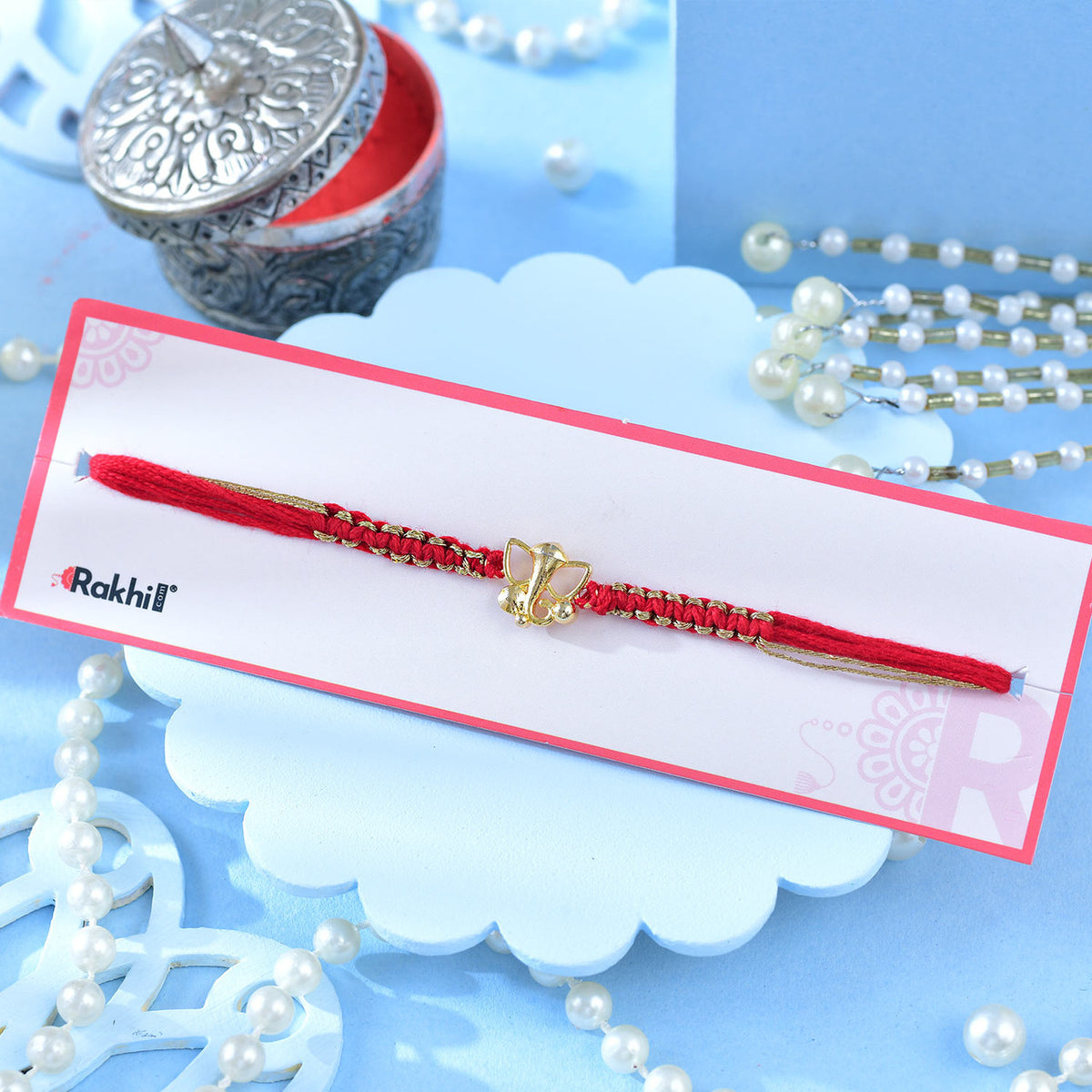 Gold Plated Ganesha Thread Rakhi