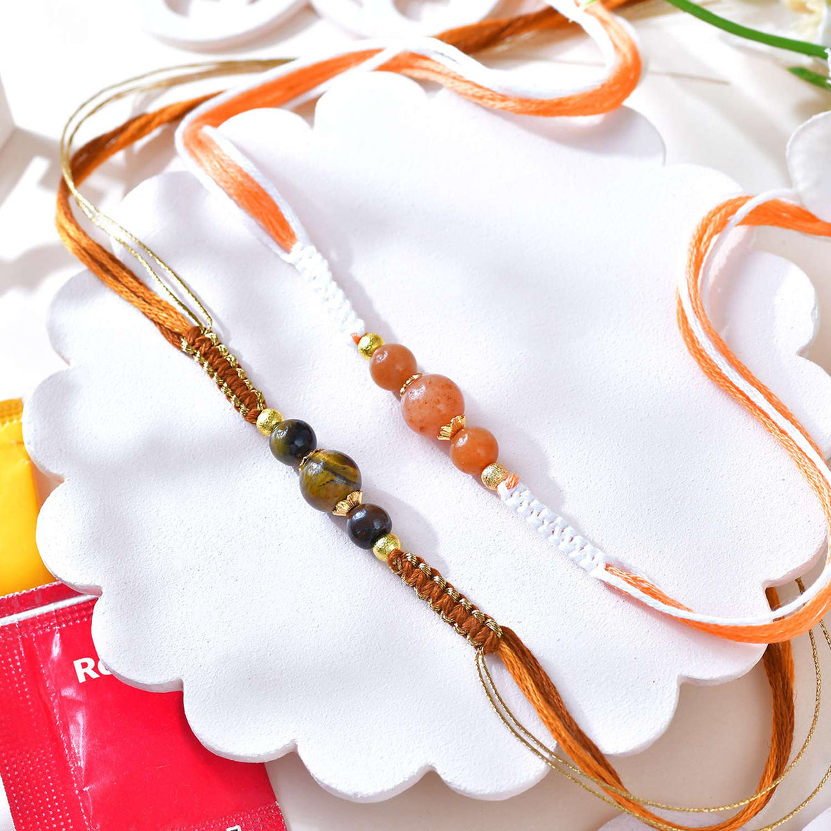Elegant Set of 2 Beaded Rakhi with Chocolate Bar
