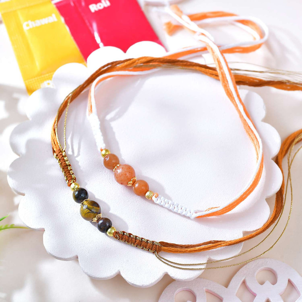 Elegant Set of 2 Beaded Rakhi with Tiger’s Eye and Peach Beads