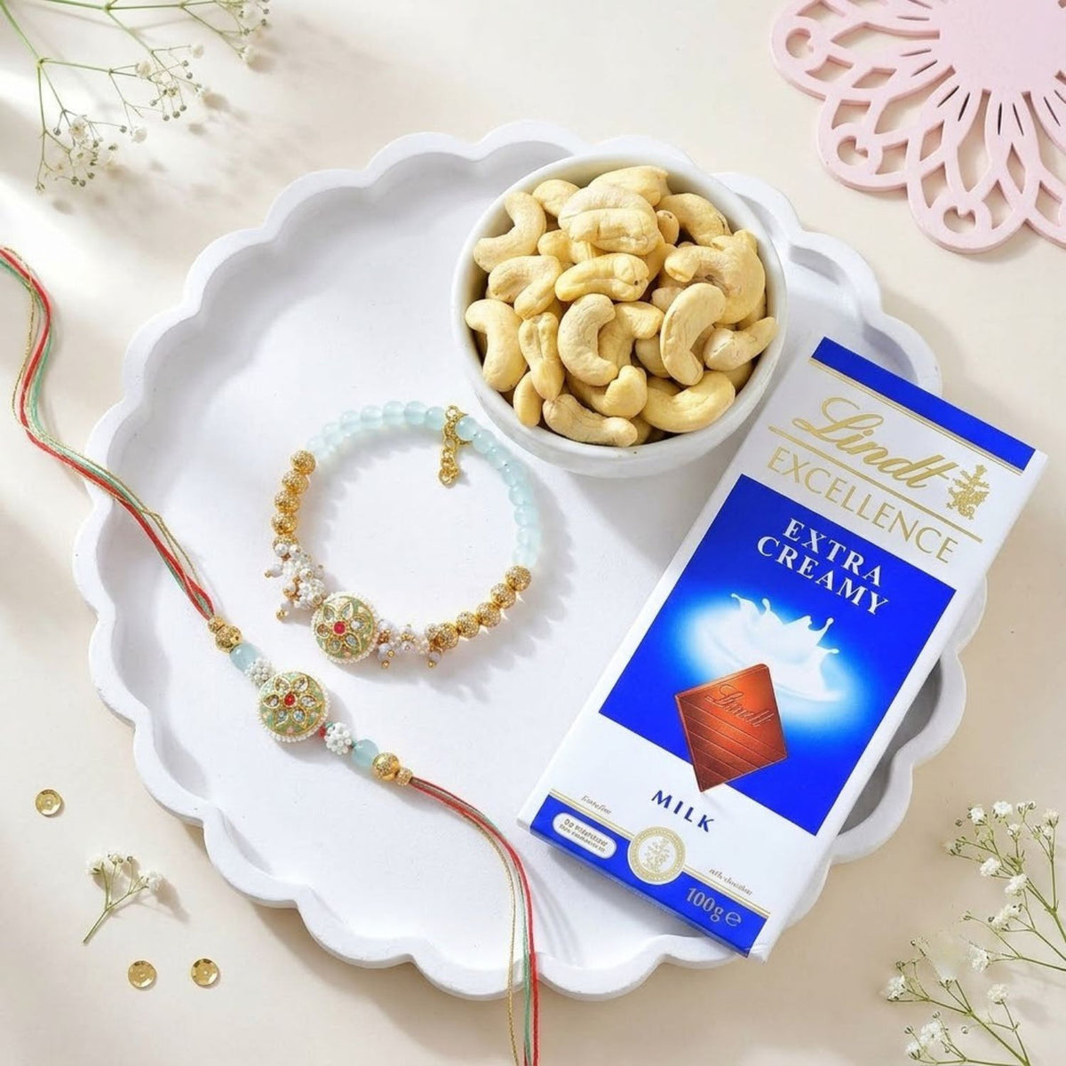 Bhaiya Bhabhi Rakhi Set With Lindt Chocolate & Cashew