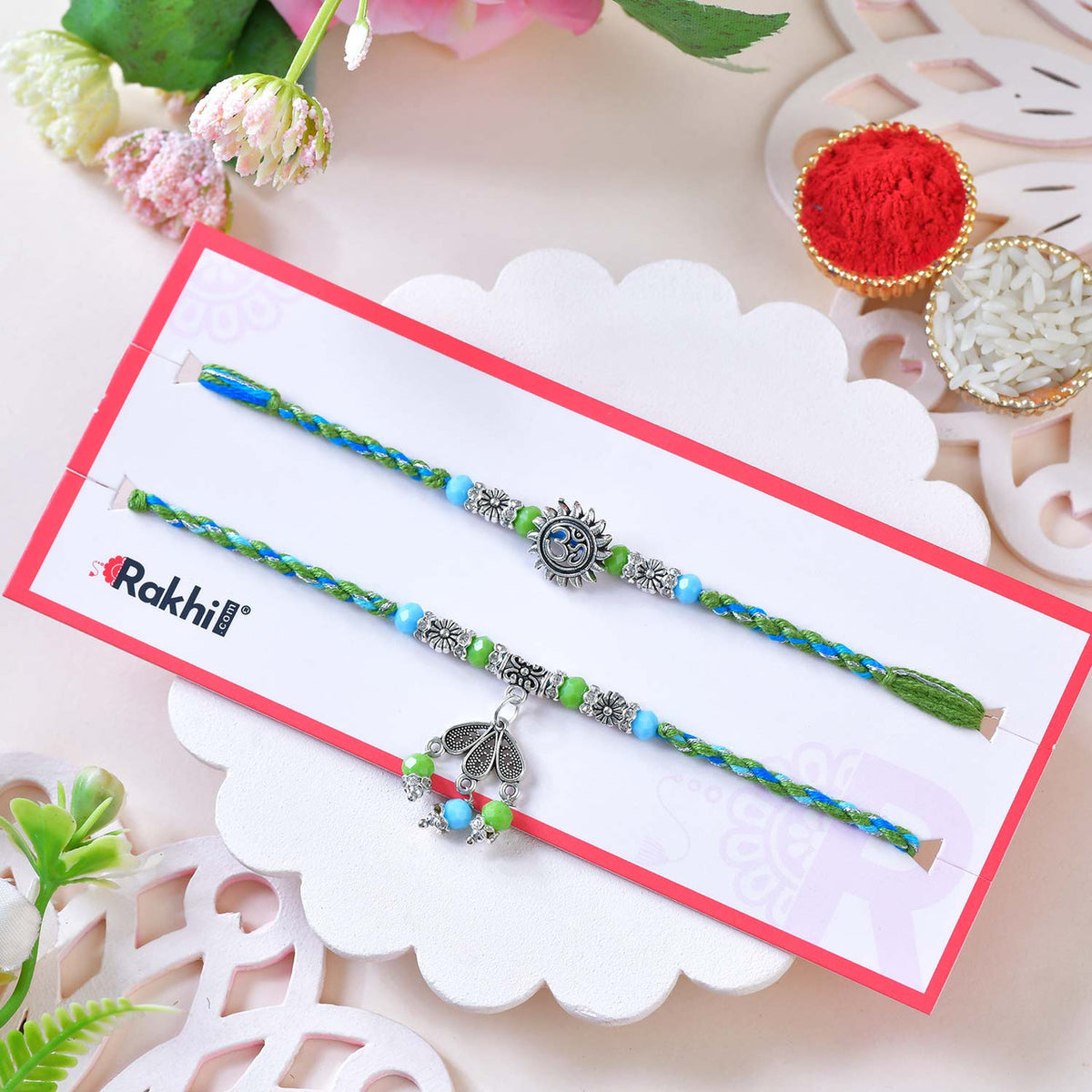 Blue-Green Designer Rakhi Set with Om & Peacock Charm