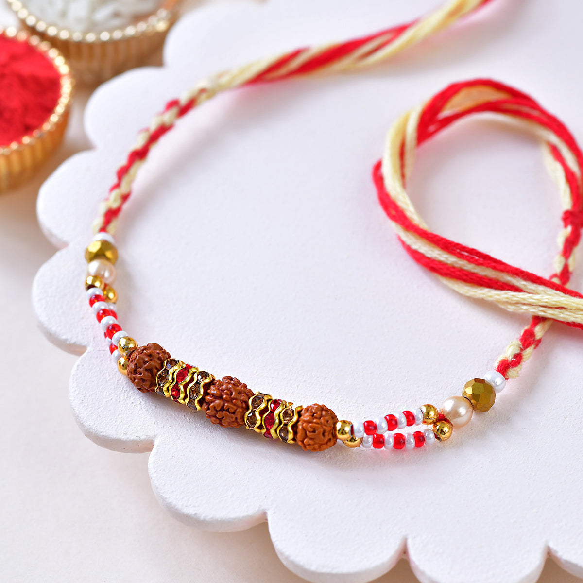 Sacred Rudraksha & Spiral Charm Rakhi Set