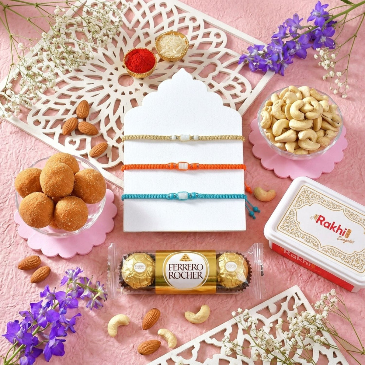 Trio Rakhi Delight Hamper with Ferrero, Besan Laddoo & Cashews