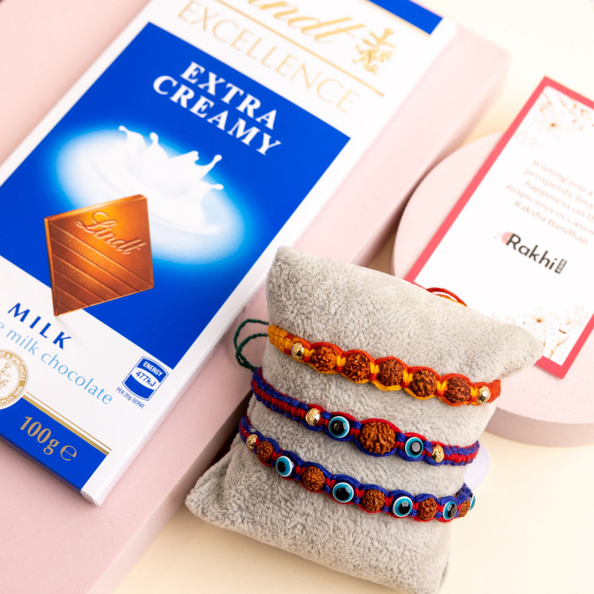Rudraksha and Evil Eye Beads Rakhi with Lindt Milk Chocolate