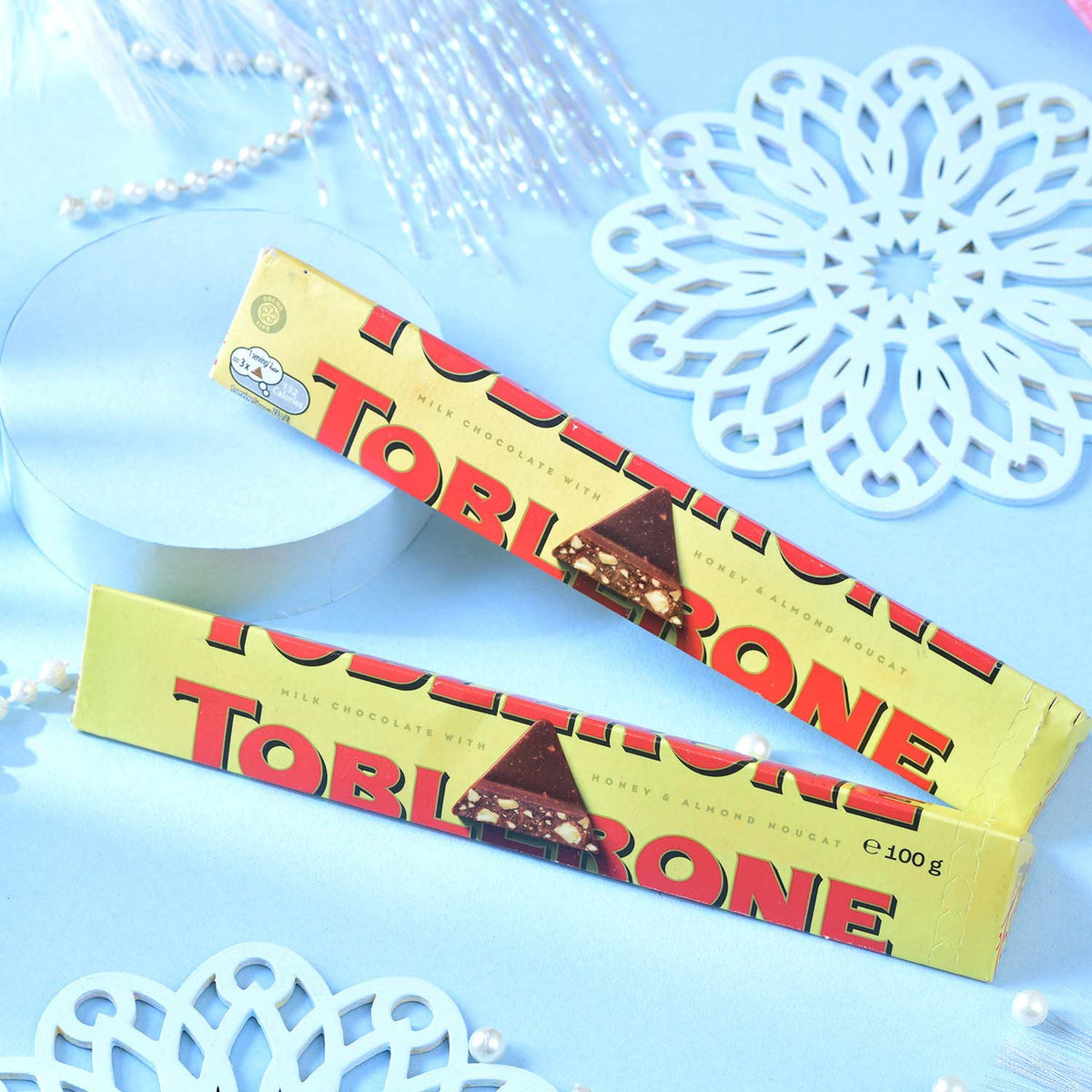 Designer Rakhi Set with Besan Laddoo & Toblerone Chocolates