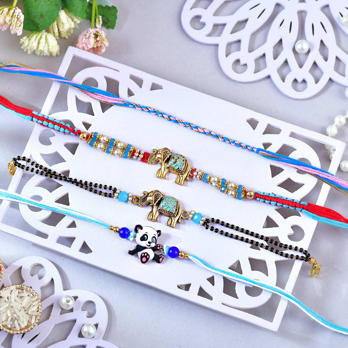 Pack of 4 Designer Rakhis with Baklawa Sweet