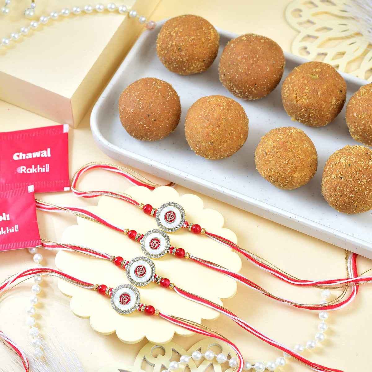 Divine Ik Onkar & Khanda Family Rakhi Set with Besan Laddoo