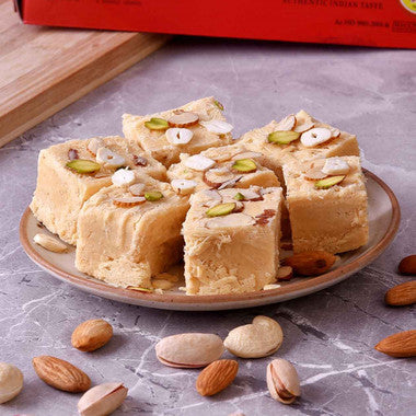 Brass Laxmi Diya with Lindt & Soan Papdi